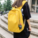 Christmas Gift Fashion casual yellow backpack Unisex large capacity waterproof nylon travel backpack Teen girl student Mochila Men's laptop bag