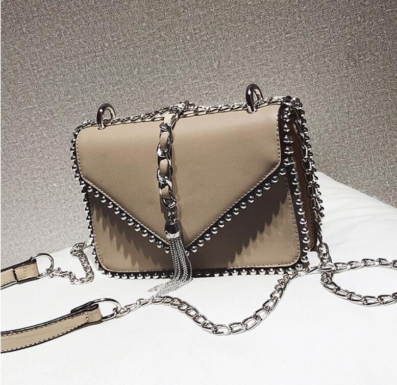 Christmas Gift British Fashion Simple Small Square bag Women's Designer Handbag 2021 High-quality PU leather Rivet Tassel Chain Shoulder bags