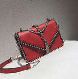 Christmas Gift British Fashion Simple Small Square bag Women's Designer Handbag 2021 High-quality PU leather Rivet Tassel Chain Shoulder bags