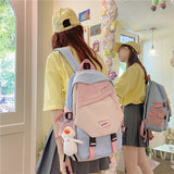 DCIMOR New Waterproof Nylon Women Backpack Female Contrast Color Cartoon Printing Buttoned Travel Bag Teenage Girl Schoolbag